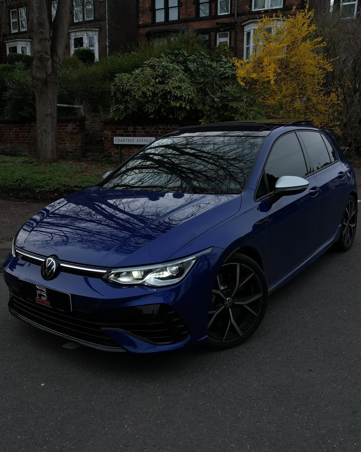 Blue Volkswagen with dark windows